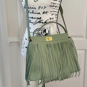 Charming Charlie Fringe Cross Body Bag